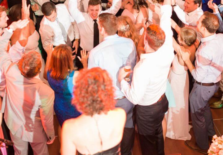 People dancing at wedding reception hosted by Wiley Entertainment