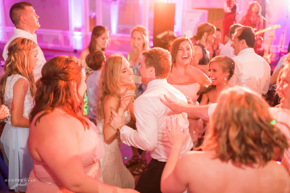 Bride and groom dancing at Wiley Entertainment hosted wedding reception
